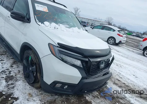 2021 Honda Passport Awd Elite z USA, uszkodzony, nr VIN 5FNYF8H01MB001928